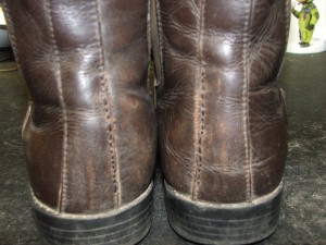 Flap handstitched onto boot and New Zip handstitched in