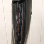 New zip handstitched into long riding boot